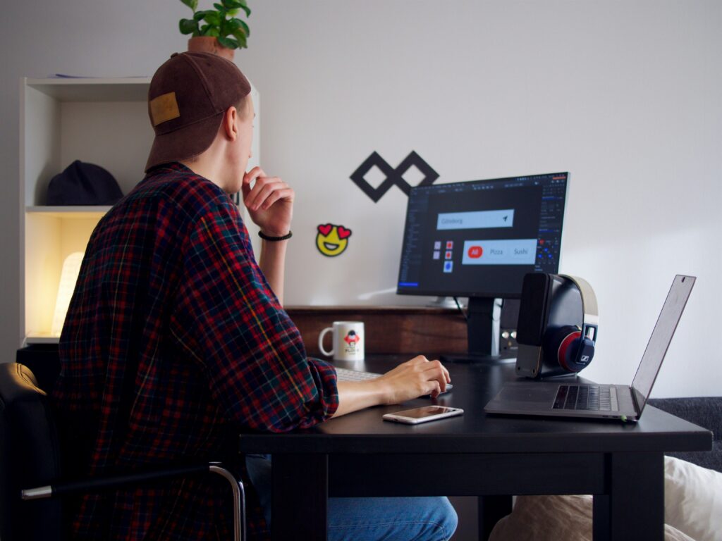 man on computer freelancer tax guide