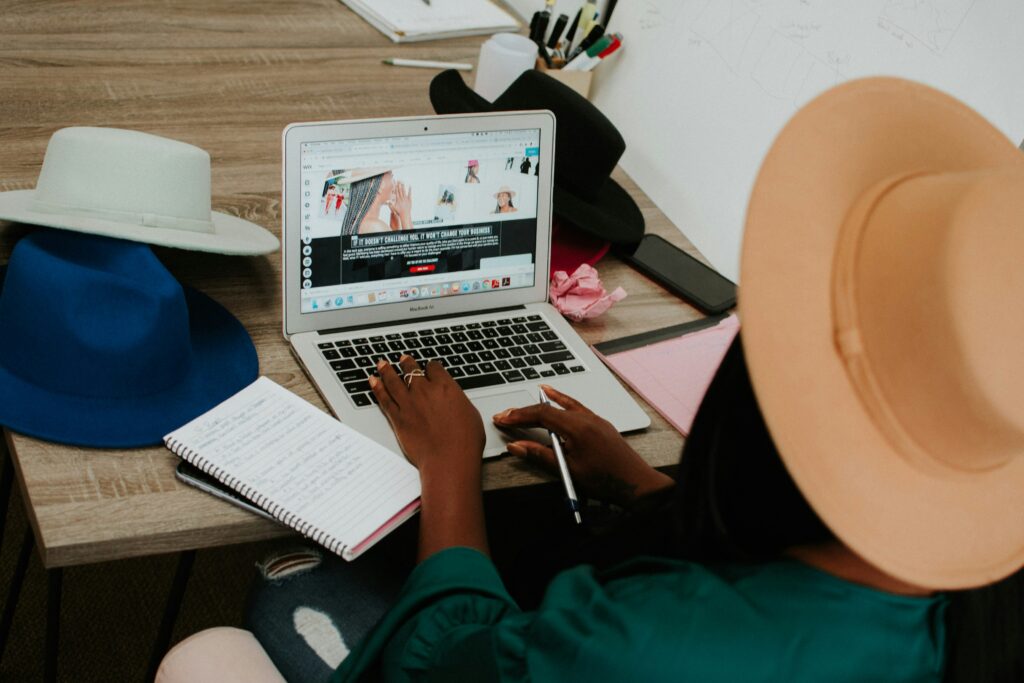 woman working on laptop Transitioning from Freelancer to Firm