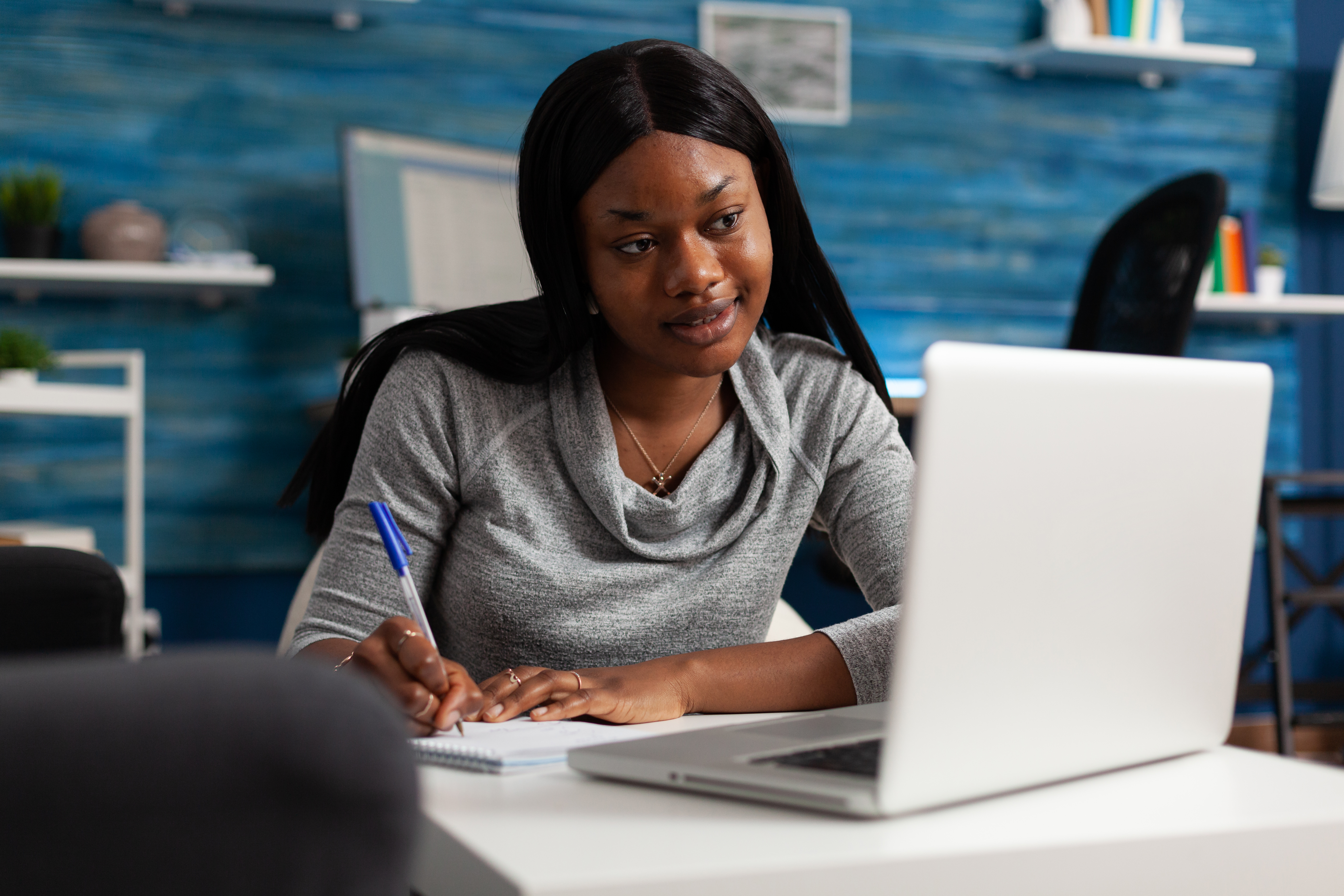 Remote Hiring Challenges woman on laptop