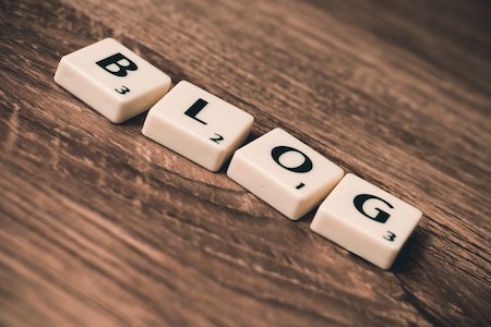 Blog Letters on Brown Wood - ways to use ChatGPT
