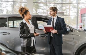 woman buying a car - buying a car for the first time