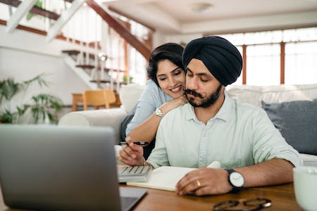 how Chat GPT4 can help you with my taxes - couple at computer