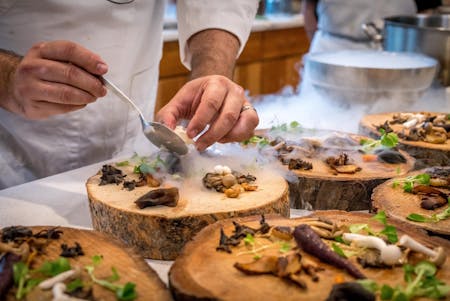 chef preparing a special dish - jobs AI can't replace