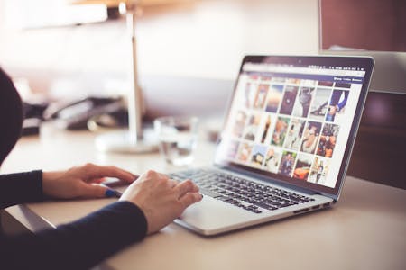 how to save money on a website person on computer