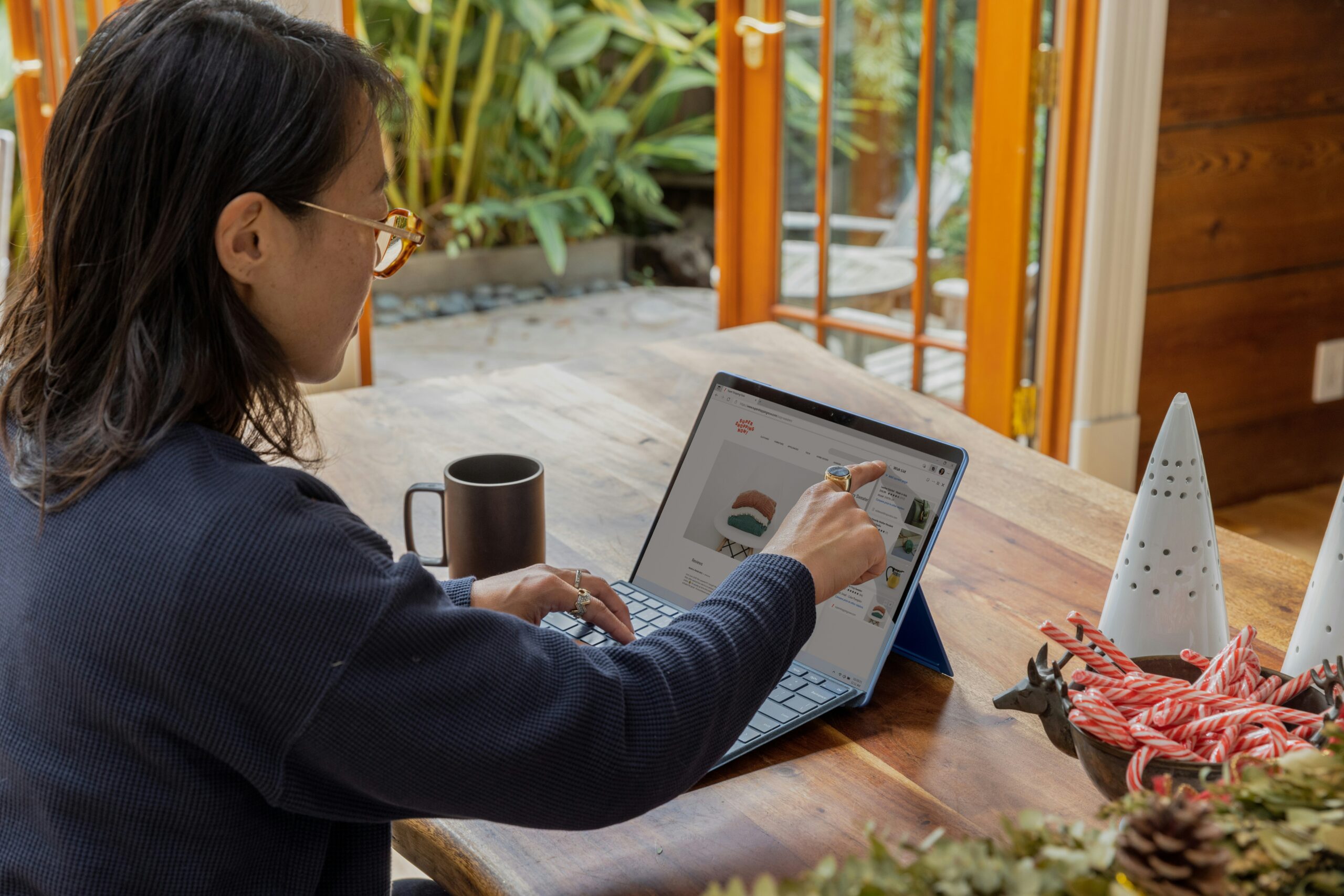 woman using laptop to do remote work remote hiring challenges