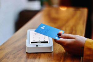 credit utilization - person using credit card