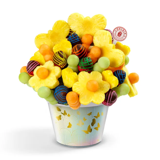 a cup of fruit and candy edible arranagements corporate gifts