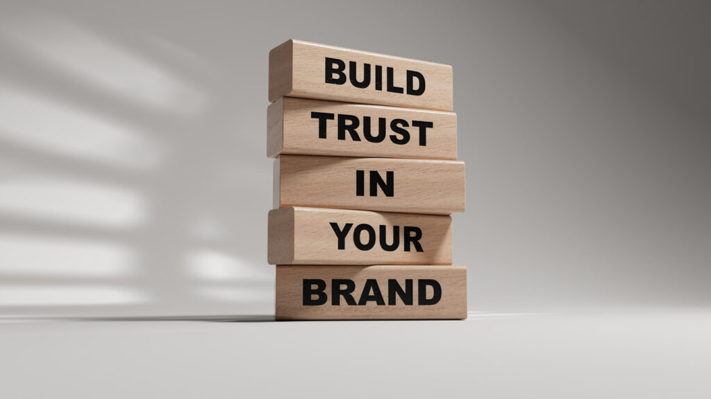 Best Branded Merchandise Ideas For Small Businesses what is a brand ambassador Build trust in your brand symbol. wooden blocks with words Build trust in your brand.Business and Build trust in your brand concept.3D rendering on white background. order business cards
