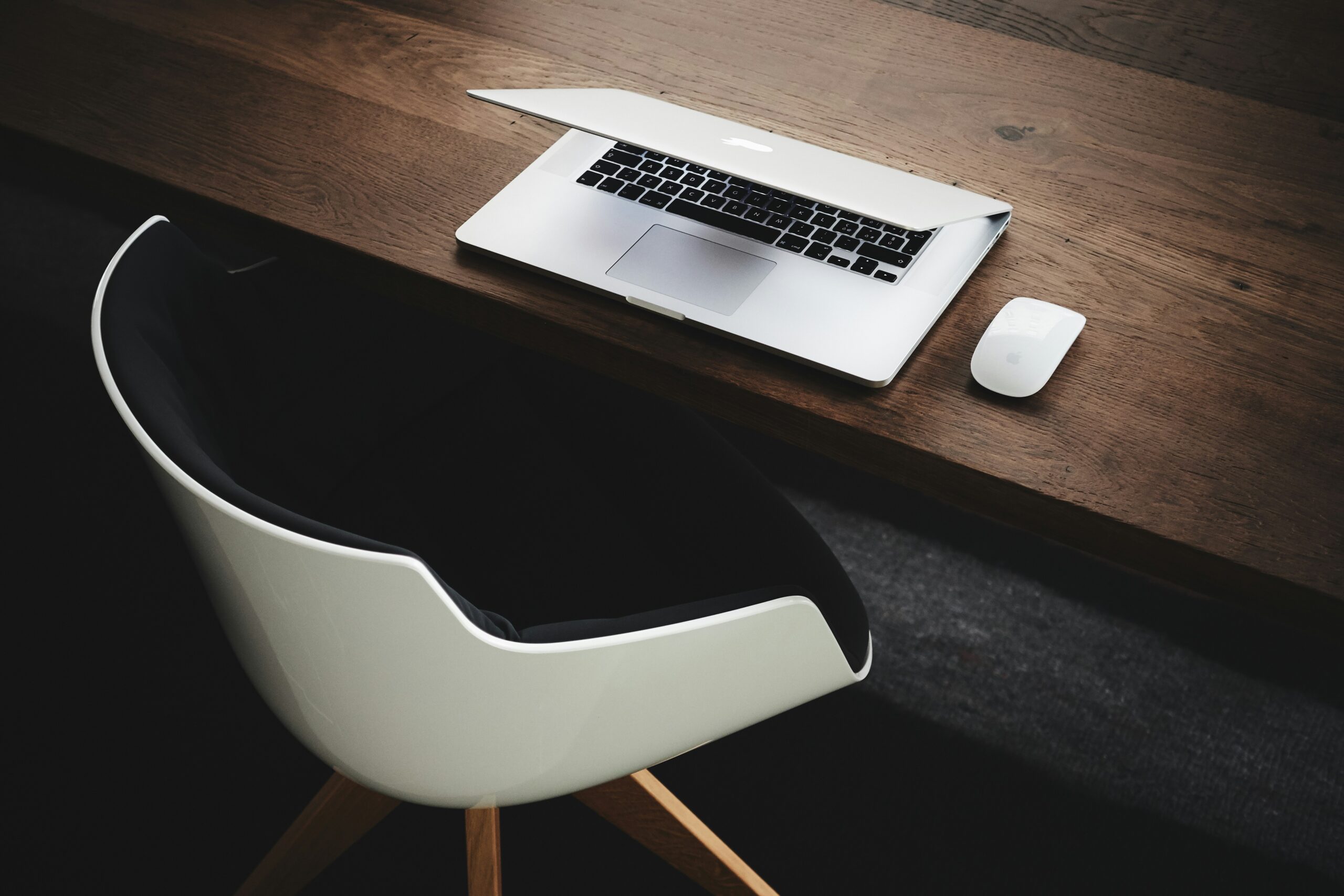 laptop on desk productive hybrid teams