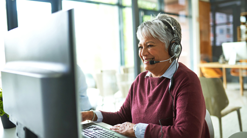 do your own taxes woman on headset small business Q1 planning checklist
