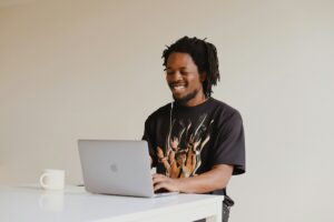 Transitioning from Freelancer to Firm man working on laptop