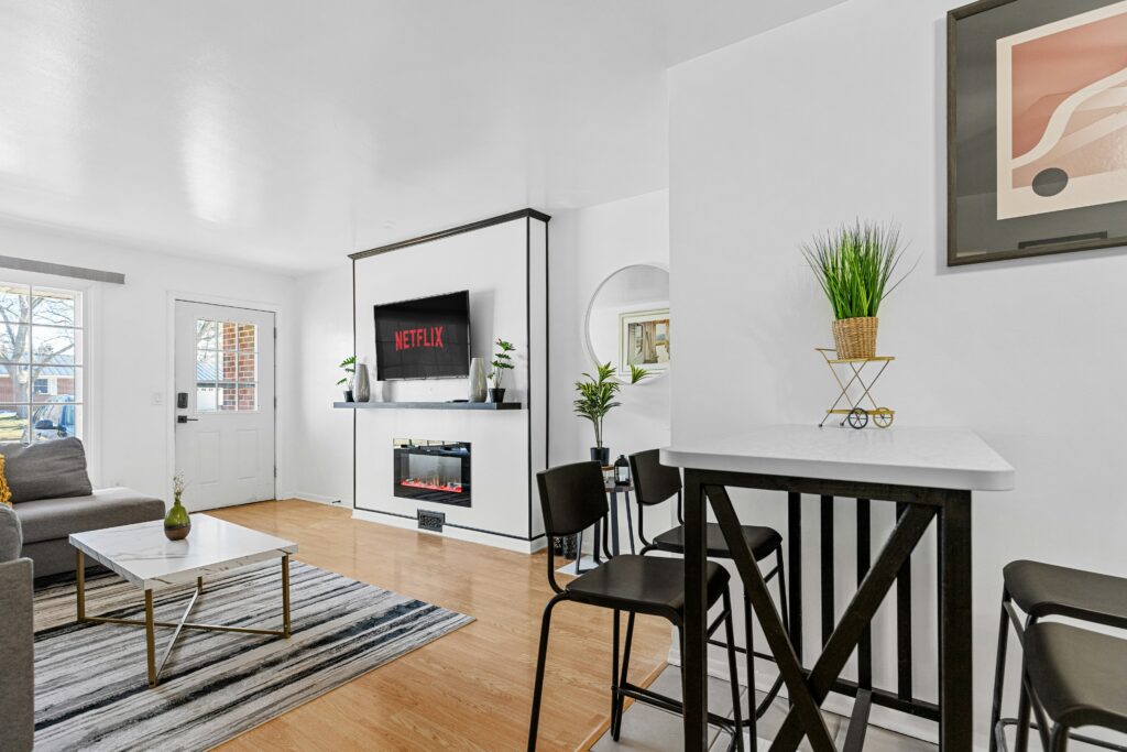 living room and foyer how to start an airbnb