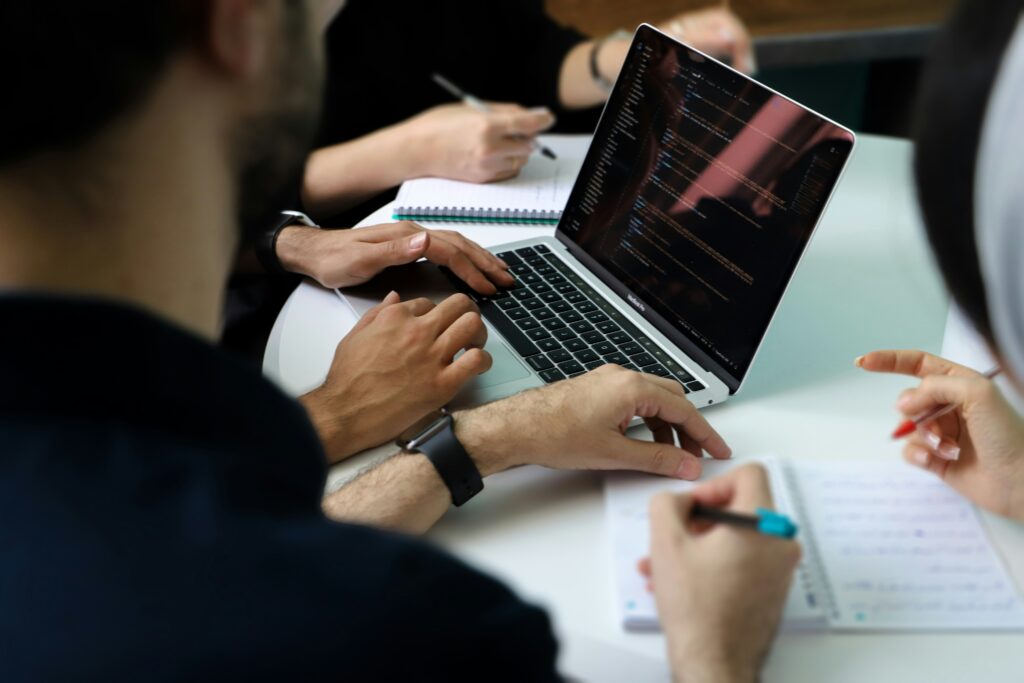 group of people on laptop When Should You Incorporate Your Business?