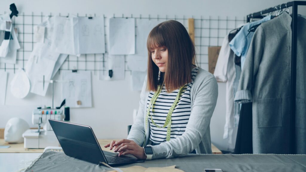 small business systems you should set up self employed freelancer woman working on computer