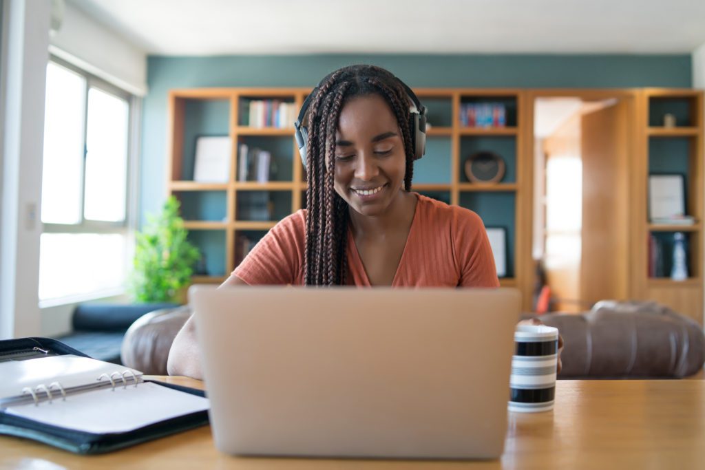 how to set up a professional home office woman in office working on laptop work from home remote work 