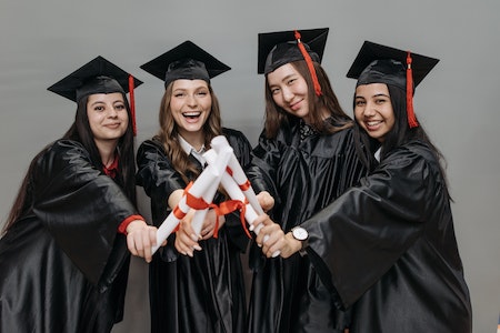 hoto of Women Holding Diploma - Hire College Students
