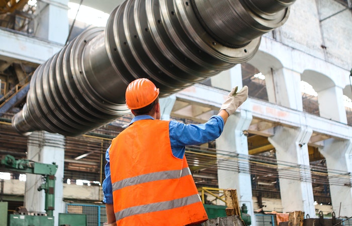 Man Standing Near Gray Metal Equipment - is public utilities a good career path