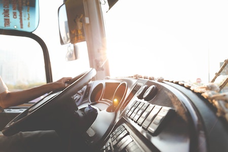 Person Hand On Steering Wheel - recruiting cdl drivers