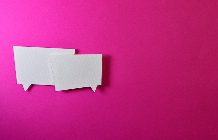 ways to use chatbot for business - Two White Message Balloons