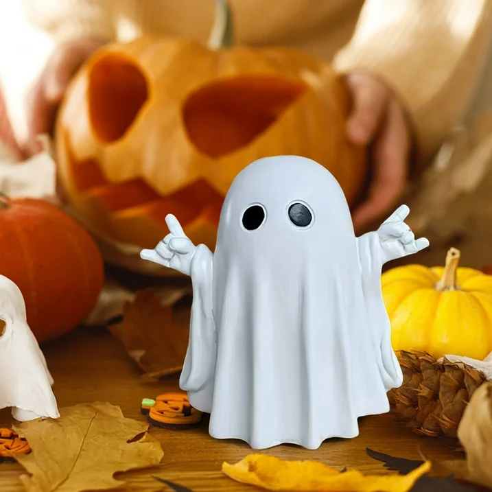 a white ghost with black eyes and a jack-o-lantern office halloween party