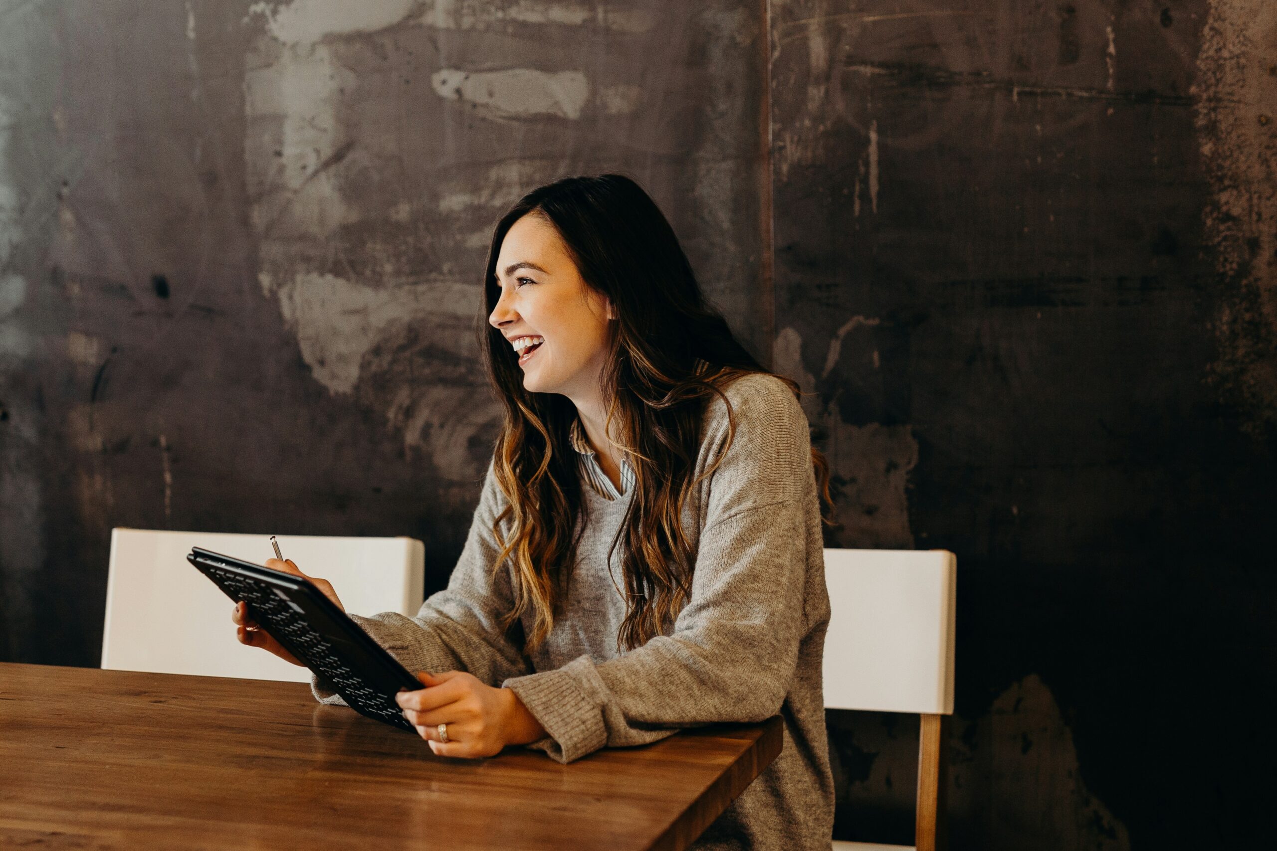 woman smiling how to attract top talent 