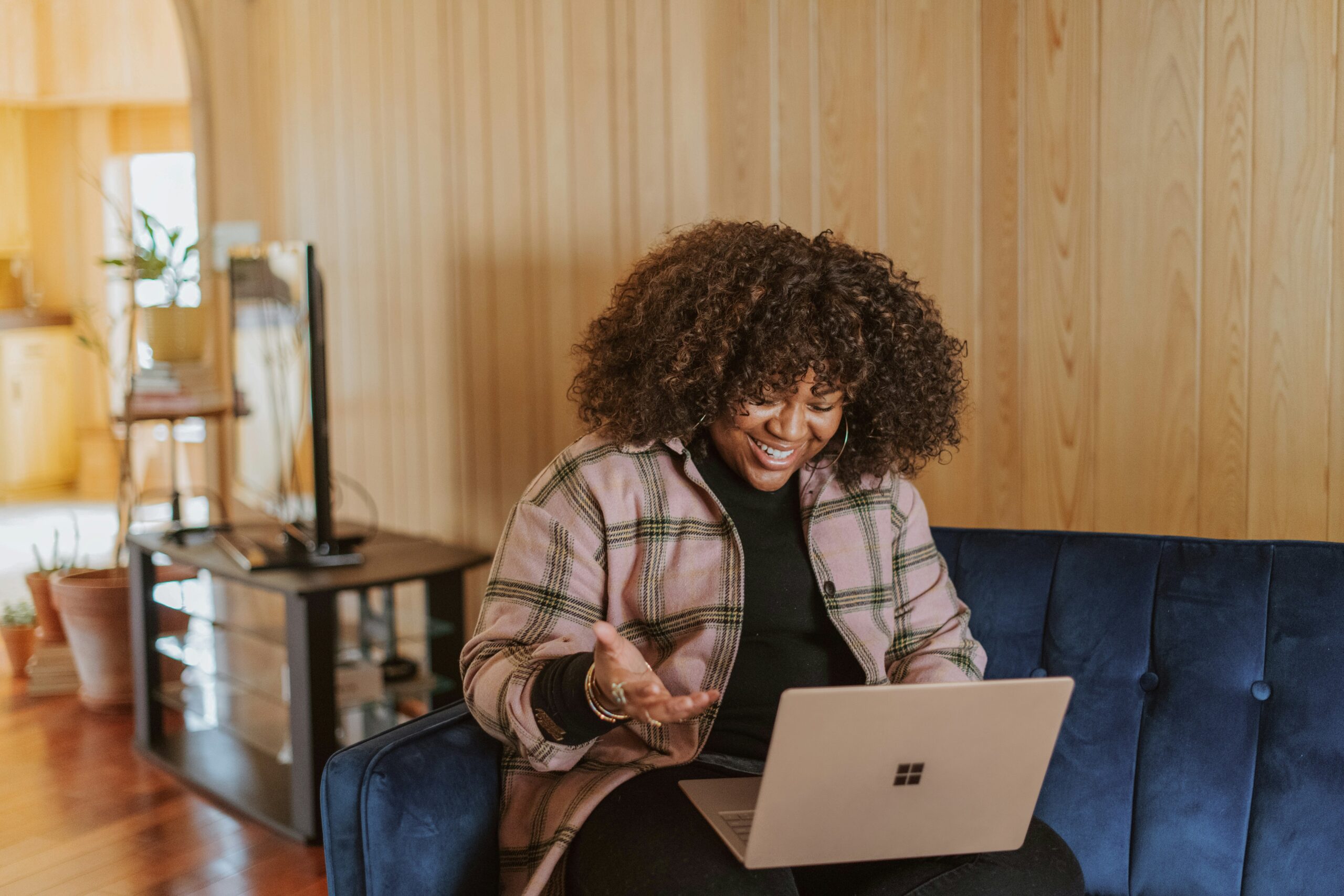 woman working from home on laptop in a meeting