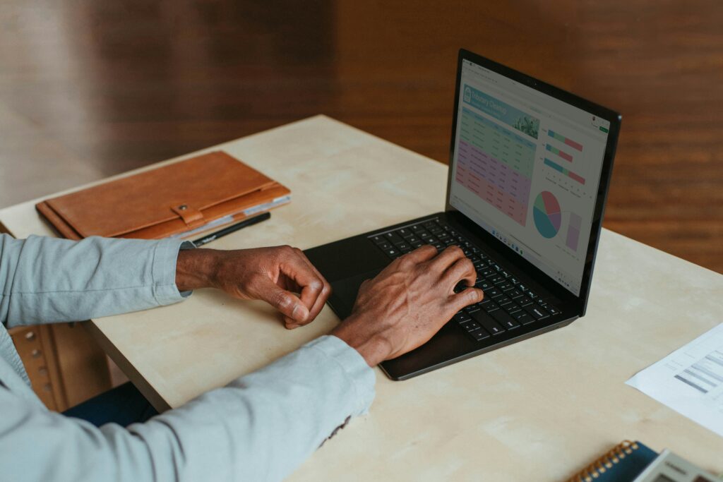 man on laptop workflow How to Start Investing with $500 or Less